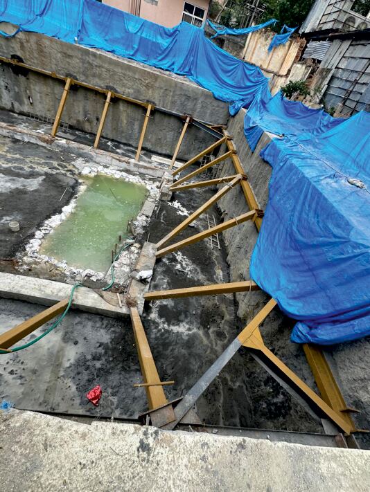 Reinforced concrete formwork ready for a foundation pour on a Bengaluru construction site